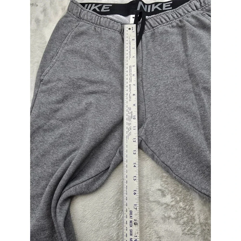 Nike Tech Fleece Joggers Men's XL Heather Gray Tapered Sweatpants.
